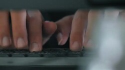 Typing Words on Keyboard,Dolly shot Stock Footage