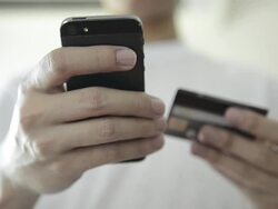 CNGLRET1047 People making mobile payment Stock Footage