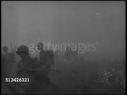 1944: BATTLE OF NOEMFOOR: VS U.S. amphibious tanks & the 158th Infantry Regiment soldiers fighting through smoke, fog, advancing inland. World War II, WWII, Pacific Front, New Guinea Campaign Instructional Video