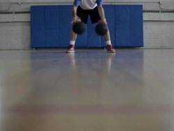 WS  young man practicing his dribbling of basketball inside  gymnasium / Minneapolis, Minnesota, United States  Stock Footage