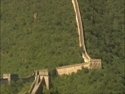 Tilt up and pans along Great Wall of China, Mutianyu, China Stock Footage