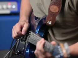 Man playing an Electric guitar Stock Footage