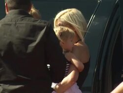 Tori Spelling (R) at the Disney/Pixar Celebrates the Launch of the World of Cars Online at Burbank CA. (Footage by WireImage Video/GettyImages) Stock Footage