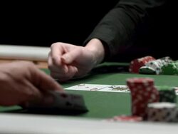 HD DOLLY: Player Checking Hole Cards With Two Aces Stock Footage