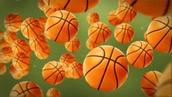 Orange basketballs float against a green background. Stock Footage