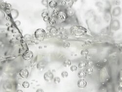 Mineral water with ice cubes HD Real Time Stock Footage