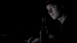 Man working on computer in the dark Stock Footage