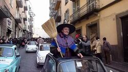 CLEAN: 'Witches' throw kids sweets from Fiat 500s in Epiphany fest News Clip