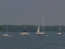 MS Yacht boats moving in lake water / Minneapolis, Minnesota, United States  Stock Footage