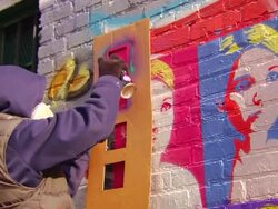 Graffiti Artist Paints with Stencil Stock Footage