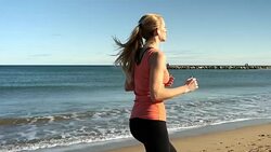 Vital running on the beach Stock Footage