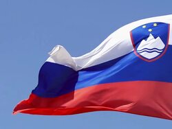 CU SLO MO Slovenia flag waving in wind / Caen, Normandy, France Stock Footage