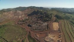 Deep grooves in the earth mark a surface mining operation in Belo Horizonte, Brazil. Stock Footage