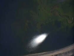 Aerial coastline with sun reflection, South Africa Stock Footage