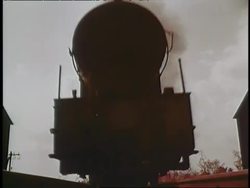 Steam billows from a train. News Clip