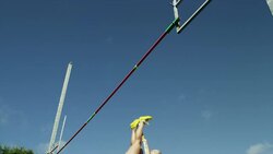 Female pole vaulter jumps and clears bar Stock Footage