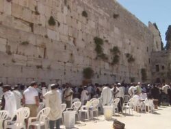 WS POV crowds praying near  Wailing Wall  AUDIO / Jerusalem,  Jerusalem, Israel Stock Footage