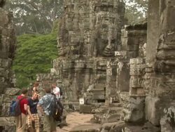 ZO Stone faces at Bayon Temple at Angkor Thom / Angkor, Cambodia Stock Footage