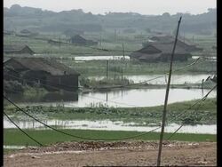 Village flooded intentionally to ease pressure News Clip