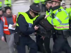 Police Contain Anti Capitalist Protests in London News Clip