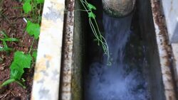 Running water out of Pipe Stock Footage