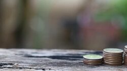 Thai baht coins stacked of bar chart in the concept of business investment. Stock Footage