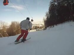 HD: Following The Skier Along Ski Slope Stock Footage