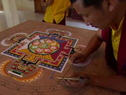 CU Monk adding to mandala / Kathmandu, Central Region, Nepal Stock Footage