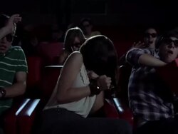 Young people watching 3d movie at the movie theater Stock Footage