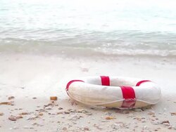 HD Dolly:Lifebuoy on the beach. Stock Footage