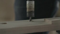 Close up of drill in piece of wood Stock Footage