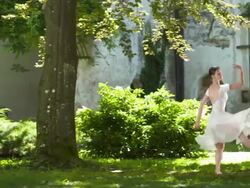 HD DOLLY: Beautiful Ballerina In The Park Stock Footage