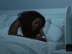 Young African American women in bed Stock Footage