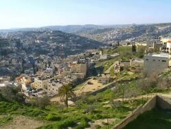 WS PAN Shot of arab villages in east Jerusalem and occupied territories devided by Israeli West Bank barrier / Jerusalem, Judea, Israel Stock Footage