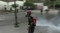 CLEAN : Police demonstrators clash in Caracas News Clip