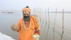Kumbh Mela Hindu festival, 2013, occurs every 12 years. Religious pilgrims taking holy bath in the Ganges River, Allahabad. Stock Footage