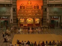 Tilt up shot Isckon temple prayer hall Bangalore Karnataka Stock Footage