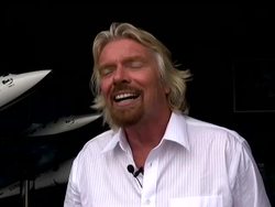 People at an air show in Wisconsin get an up-close look at an airplane designed to launch a ship into space. The aircraft comes from Virgin Galactic, part of its effort to jump-start commercial space travel News Clip