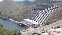 HD Dolly:Power plant, water from dam Stock Footage