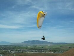 WS PAN POV Person paragliding mid-air / Lehi, Utah, USA. Stock Footage