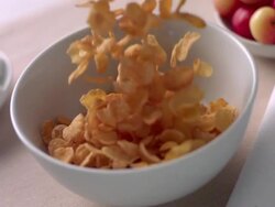 HD 600fps Corn flakes falling in a bowl Stock Footage