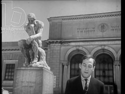 Presenter Daniel Dorian outside the Detroit Institute of Arts in Michigan, USA, 1965 Stock Footage