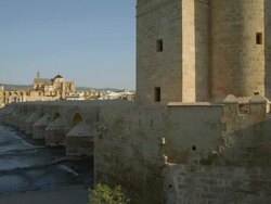 WS PAN from Calahorra Tower across Roman bridge, Guadalquivir river to Cathedral-Mosque Stock Footage