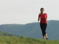 HD: Woman Jogging Stock Footage