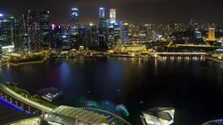 Lights from a show reflect in Marina Bay. Stock Footage