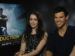 INTERVIEW Lily Collins Taylor Lautner on training, karate, boxing, doing things he's not done before at the Abduction Interviews at London England. (Footage by WireImage Video/Getty Images Entertainment Video) Stock Footage