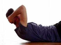 Sit-ups, young male. Stock Footage