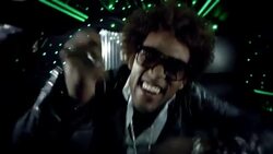 Hip-hop star dances for camera while fans pound on windows and wave at awards show Stock Footage