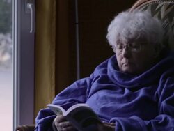Elderly woman reading Stock Footage