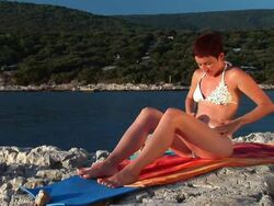 HD TIME-LAPSE: Applying Suntan Cream Stock Footage